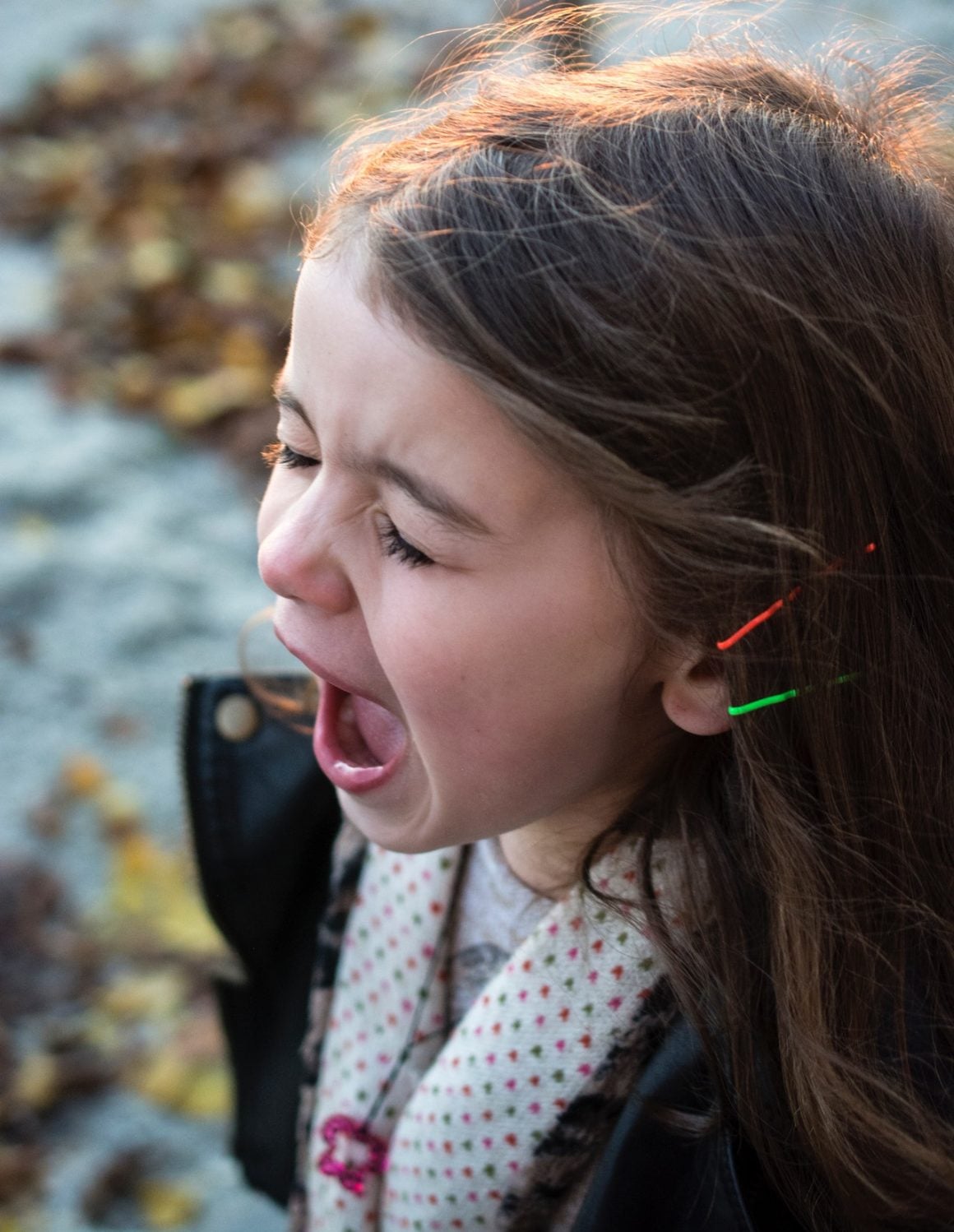 girl-wearing-black-jacket-and-gray-shirt-with-open-mouth-116151