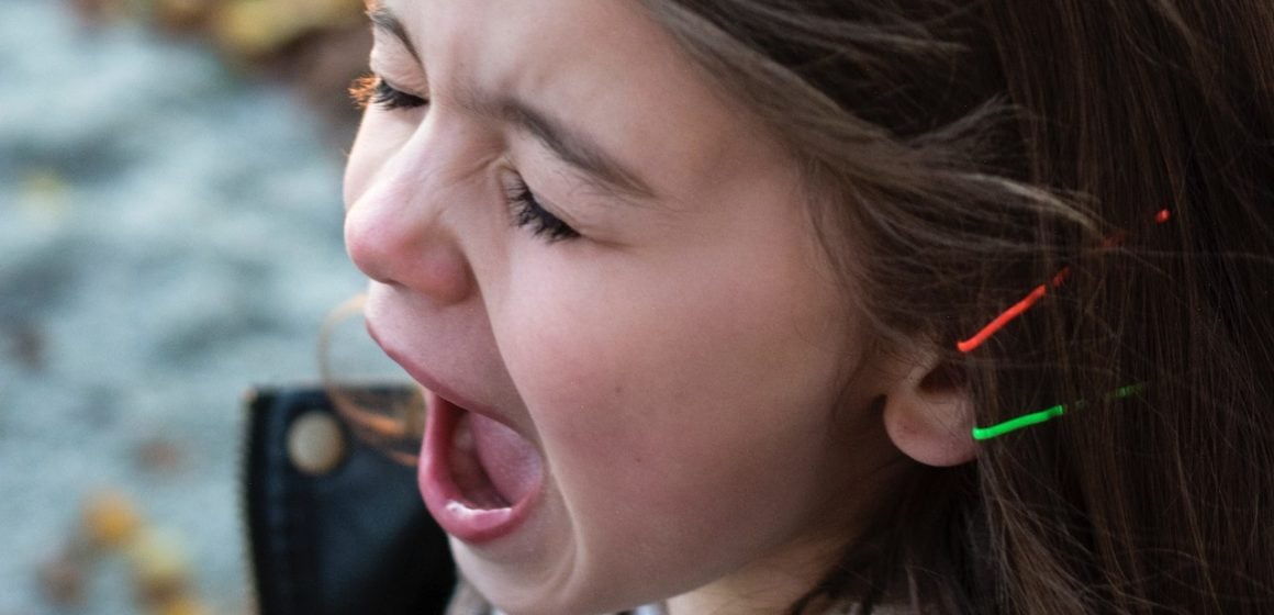 girl-wearing-black-jacket-and-gray-shirt-with-open-mouth-116151